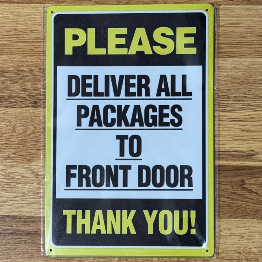 Yellow and Black Delivery Sign